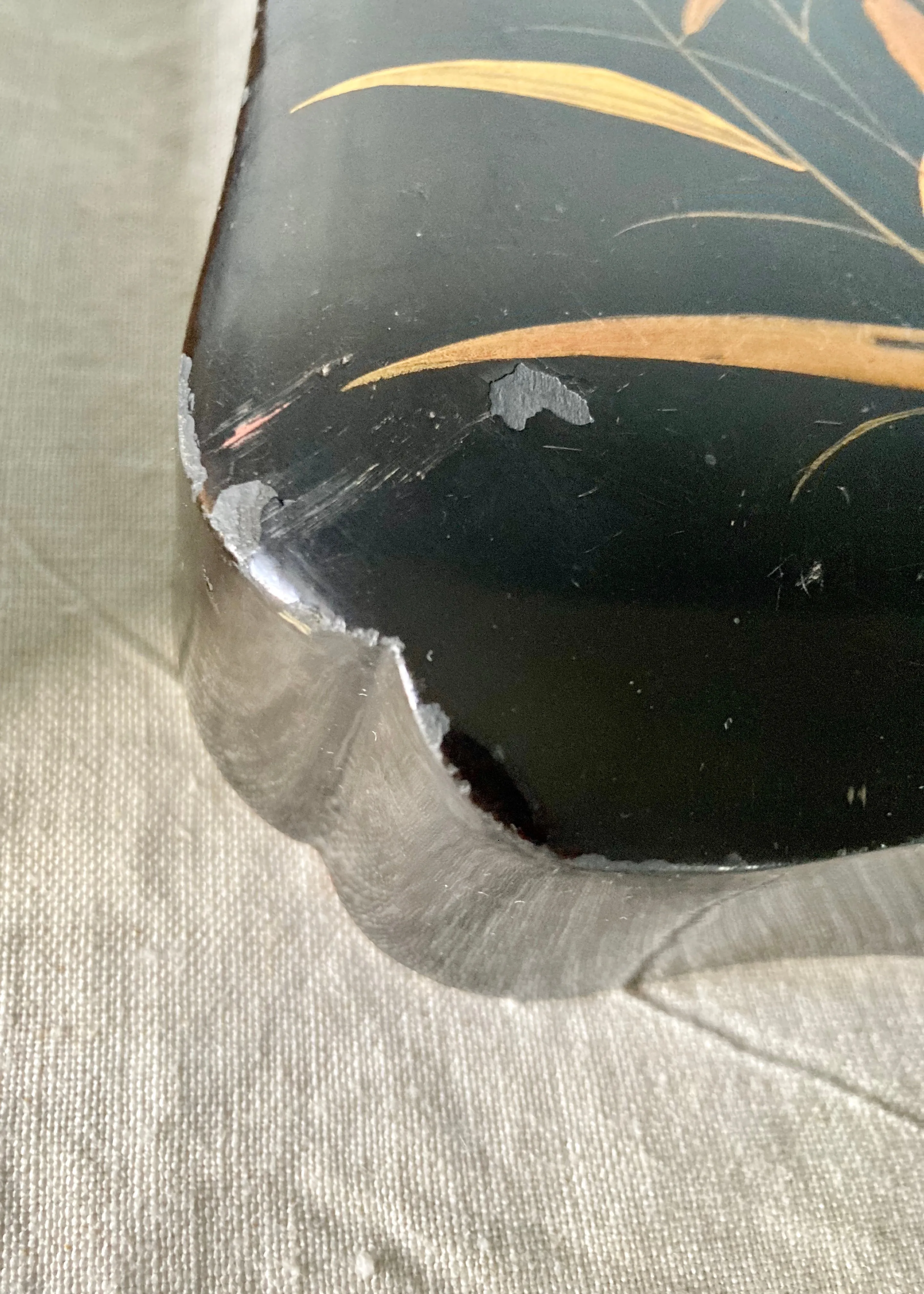 Black box with gilt oriental-inspired decoration